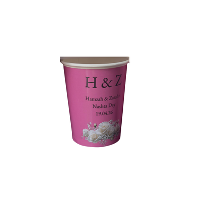 Pink paper cup with floral design and text on a white background - custom cups